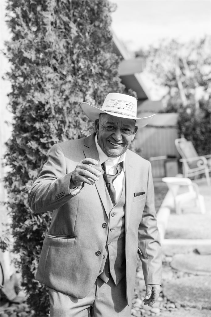 bride's dad in cowboy hat at backyard palm springs wedding venue