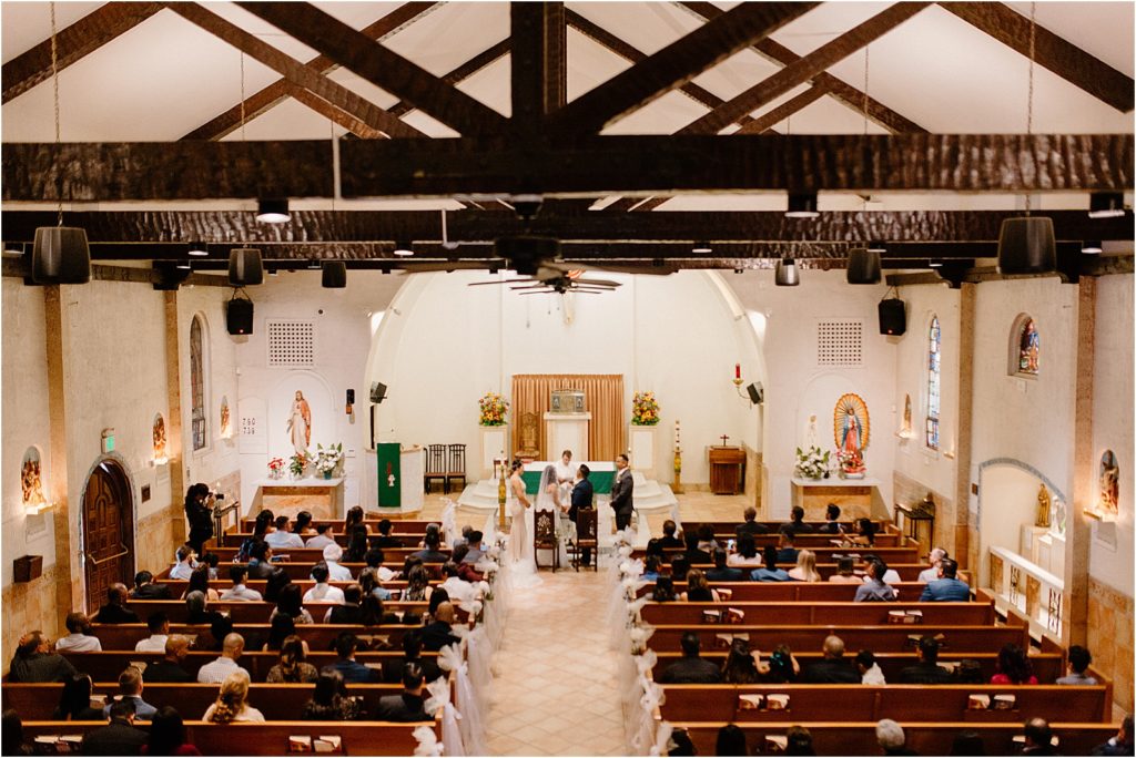 aerial shot of ceremony inside cathedral at backyard palm springs wedding venue