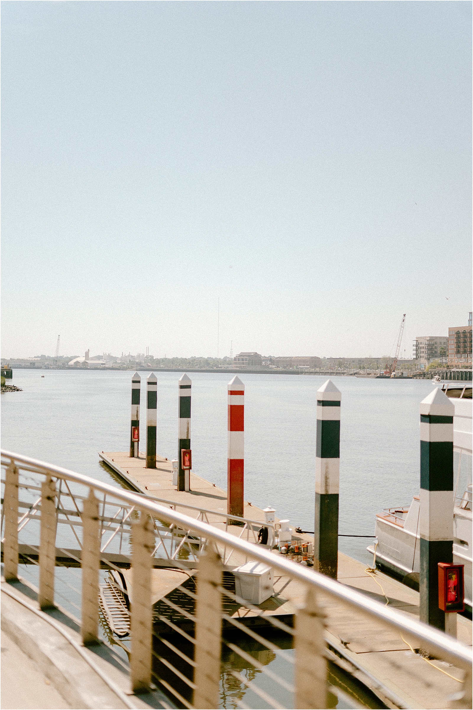 The Westin Savannah dock overlooking Savannah Harbor with River Street in the background