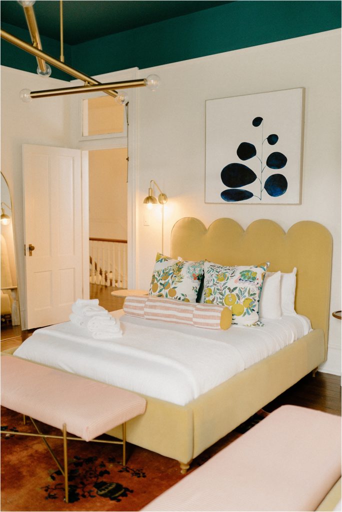 Gingerbread House Wedding Venue Chartreuse bed frame with scaloped headboard