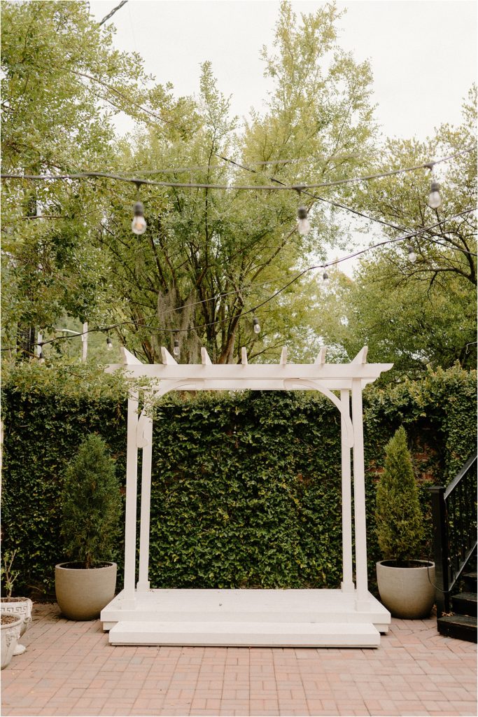 Gingerbread House Wedding Venue backyard patio with pergola for ceremonies